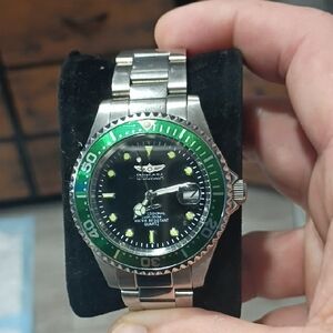 Invicta Silver Watch with Green Bezel